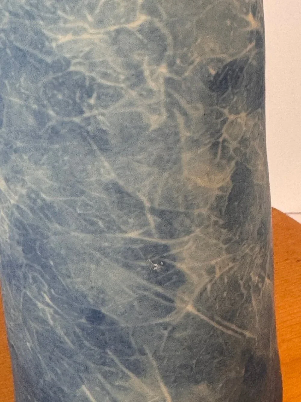 Bud vase or cylinder with blue and white soft cloud like marbled pattern